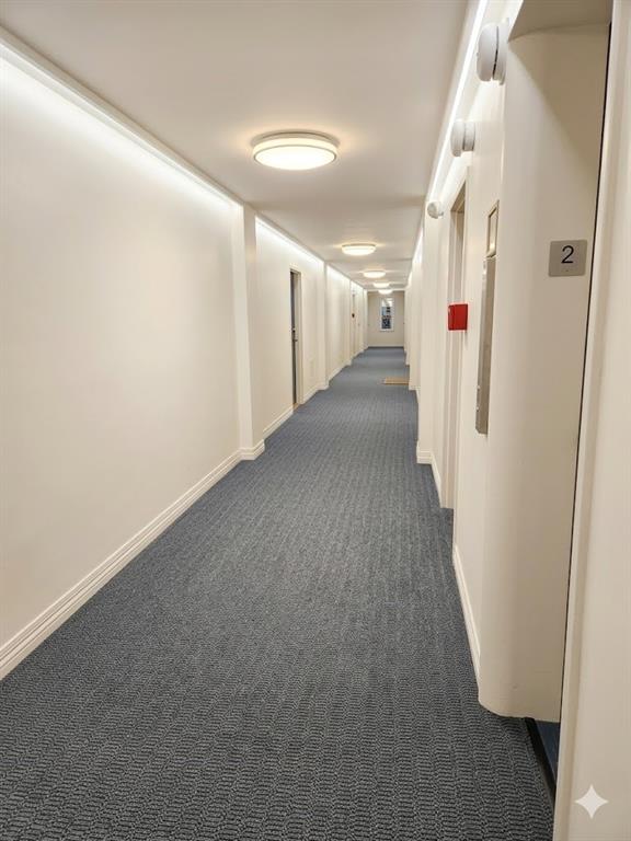 415 Bigham Street, Unit 23 Pittsburgh, PA 15211 - Photo 5 of 24 a view of a hallway with wooden floor