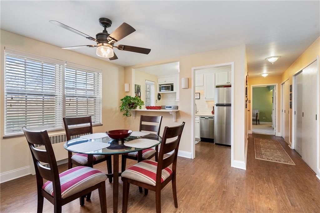 415 Bigham Street, Unit 23 Pittsburgh, PA 15211 - Photo 7 of 24 a dining room with furniture and window