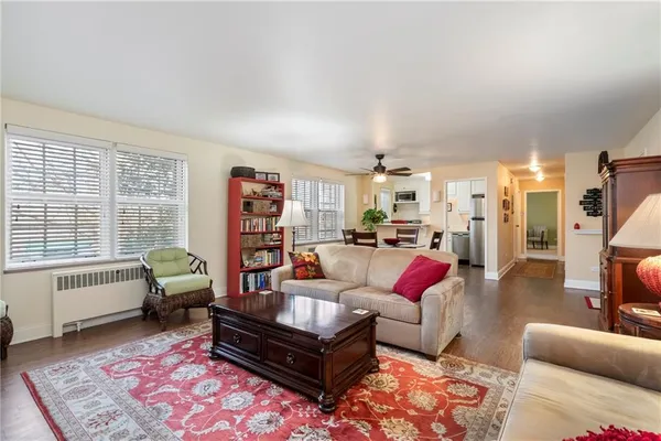 a living room with furniture or couch and a table