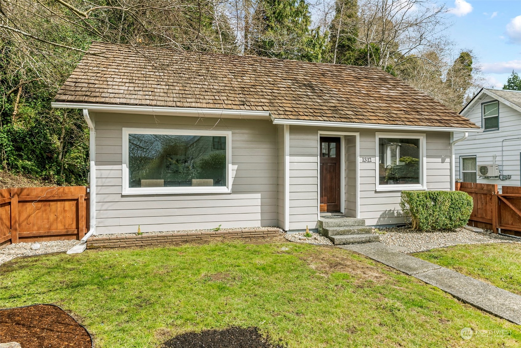 1312 Summit Street Aberdeen, WA 98520 - Photo 22 of 37 a front view of a house with garden