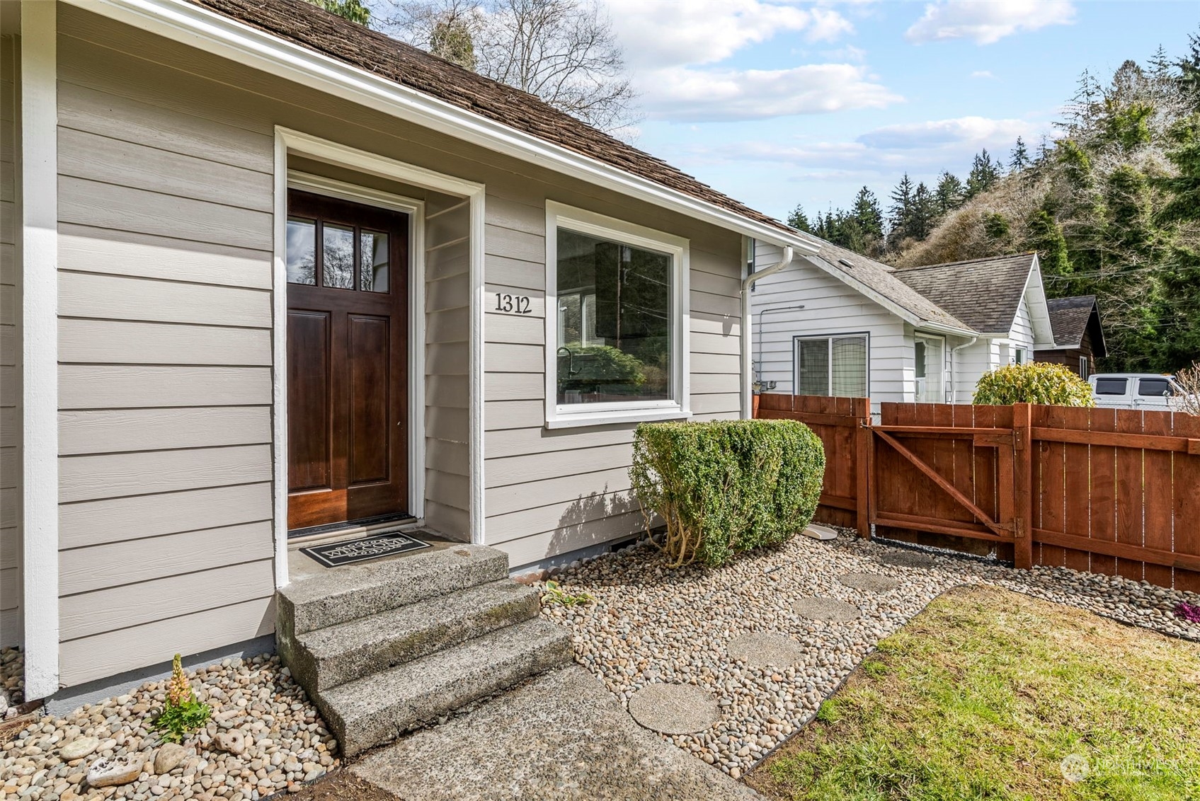 1312 Summit Street Aberdeen, WA 98520 - Photo 23 of 37 a view of a house with backyard and sitting area
