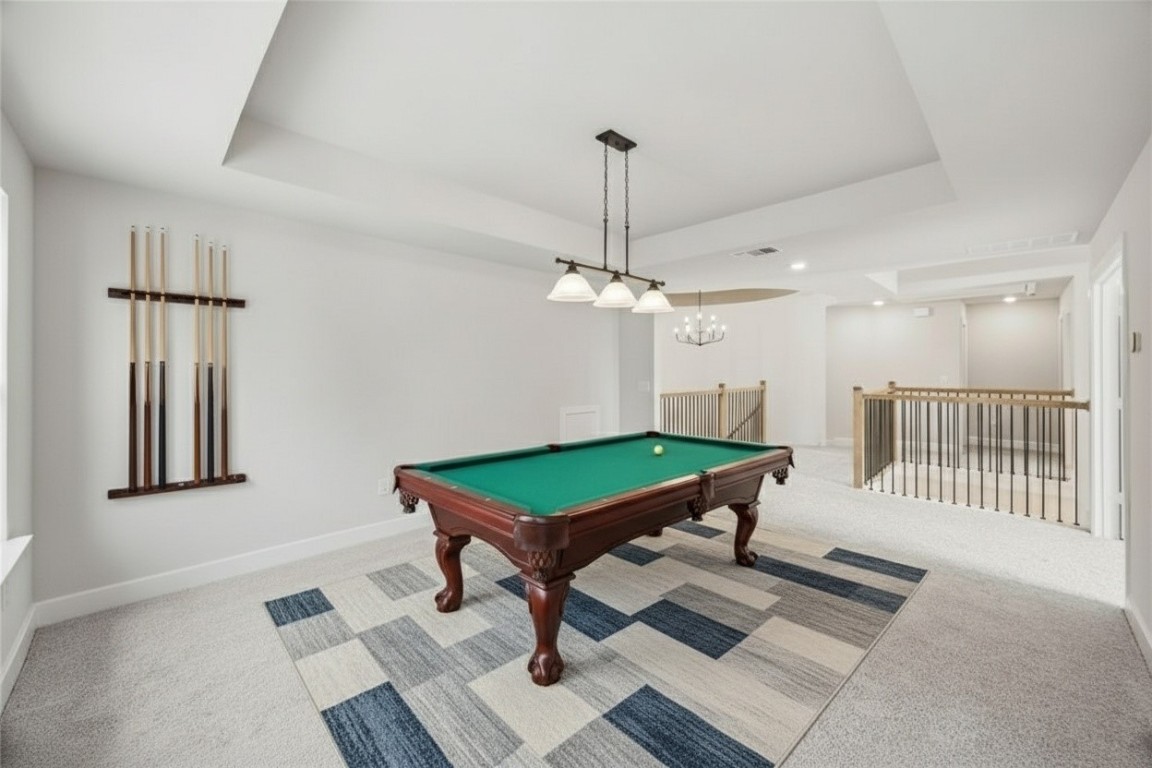 1417 Rodeo Ridge Drive Georgetown, TX 78628 - Photo 21 of 37 Recreation room with light carpet, a tray ceiling, and pool table