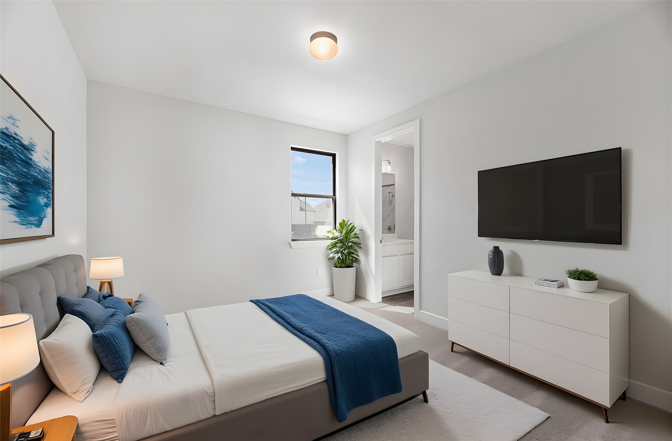 1417 Rodeo Ridge Drive Georgetown, TX 78628 - Photo 26 of 37 Carpeted bedroom featuring baseboards and ensuite bath