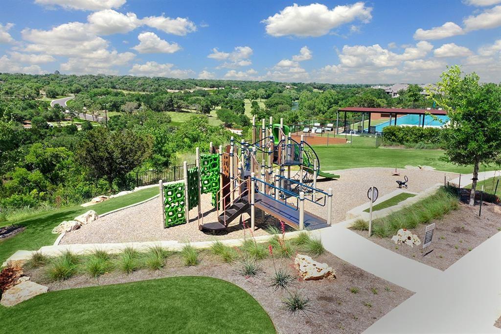 1417 Rodeo Ridge Drive Georgetown, TX 78628 - Photo 36 of 37 Community playground featuring a lawn