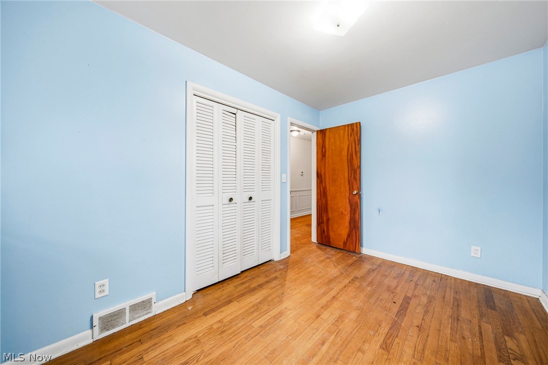 2535 Sears Road Stow, OH 44224 - Photo 22 of 34 Another view of bedroom and closet. Features hardwood floors