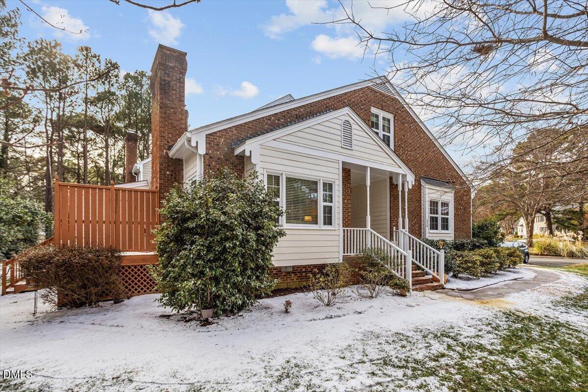 126 Skylark Way Raleigh, NC 27615 - Photo 1 of 25 Front of charming end-unit townhome