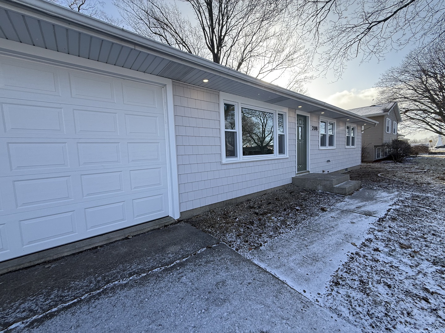 208 Sycamore Lane Momence, IL 60954 - Photo 2 of 19 a front view of a house