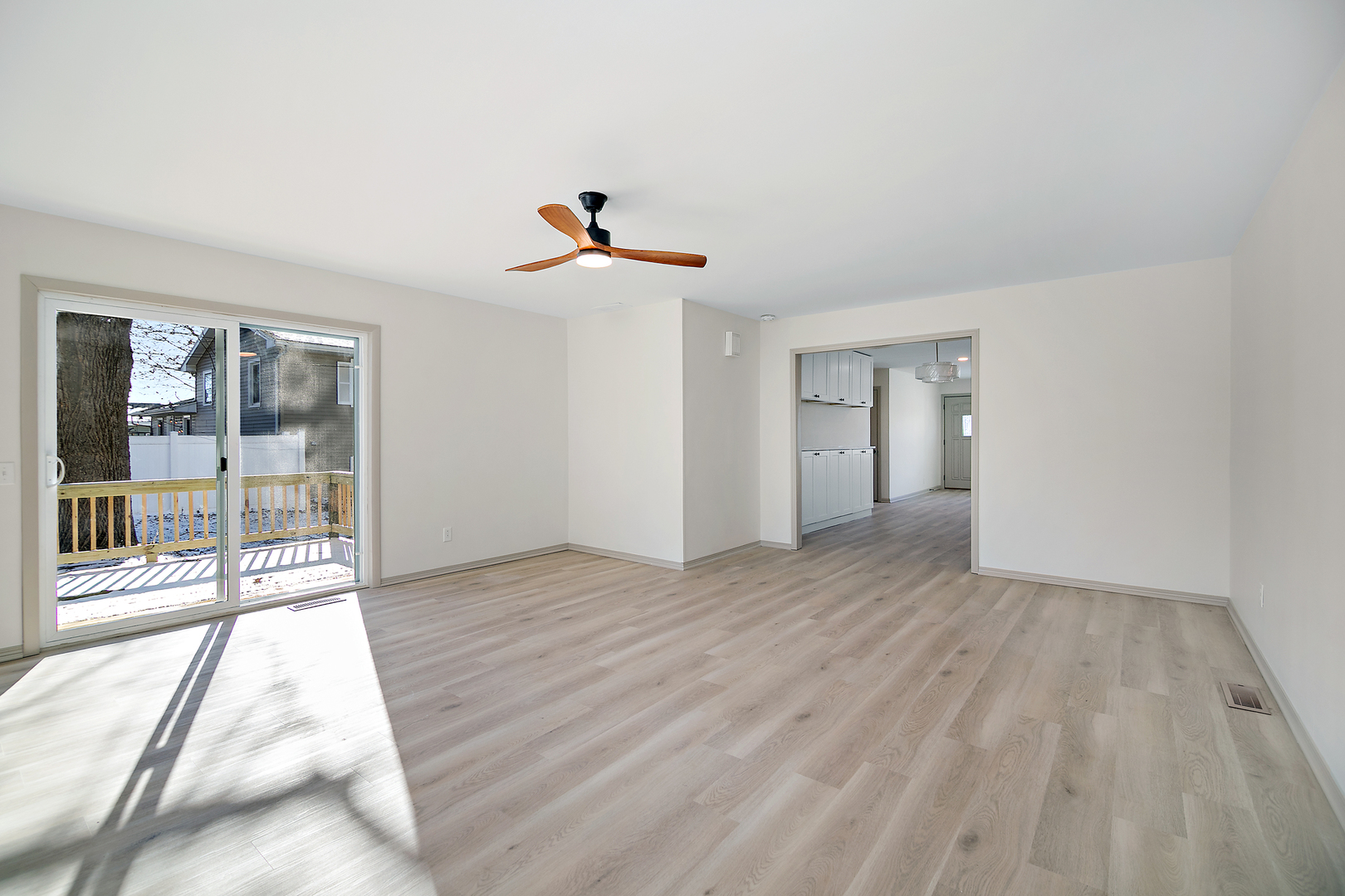 208 Sycamore Lane Momence, IL 60954 - Photo 9 of 19 a view of an empty room with glass door
