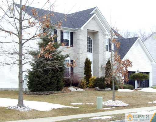 43 Stratton Road Old Bridge, NJ 07747 - Photo 1 of 1 a front view of a house with garden