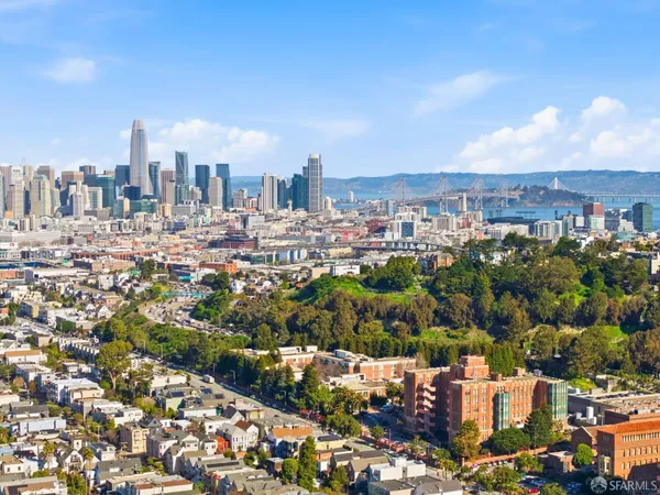 a view of a city with tall buildings