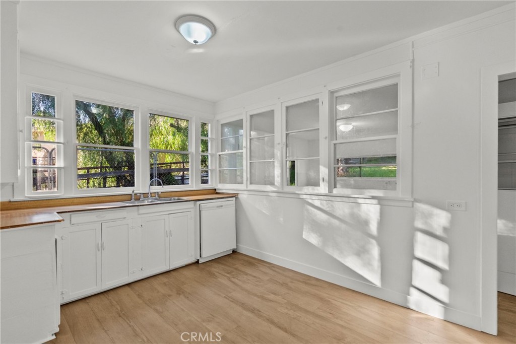 30541 Hasley Canyon Road Castaic, CA 91384 - Photo 12 of 31 a large white kitchen with granite countertop a large window