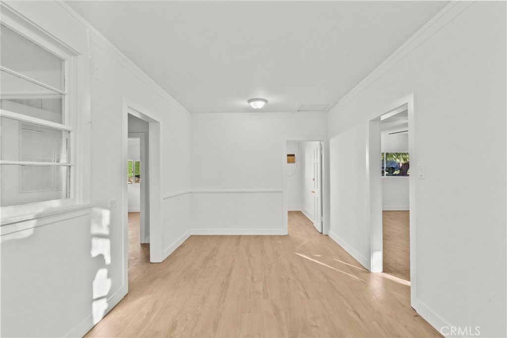 30541 Hasley Canyon Road Castaic, CA 91384 - Photo 13 of 31 a view of wooden floor in an empty room