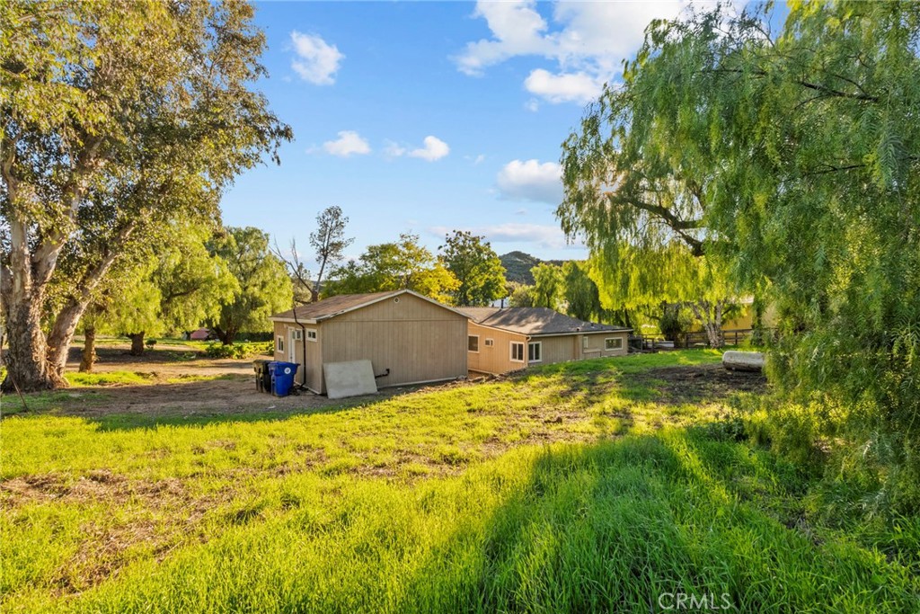 30541 Hasley Canyon Road Castaic, CA 91384 - Photo 25 of 31 a view of a yard with swimming pool