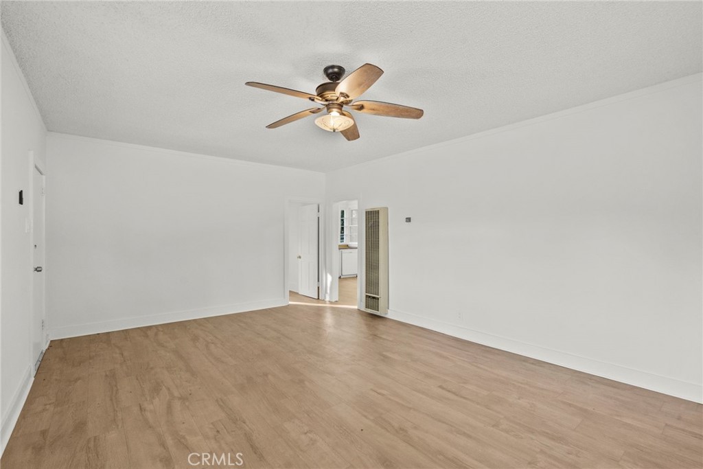 30541 Hasley Canyon Road Castaic, CA 91384 - Photo 5 of 31 a view of empty room with wooden floor