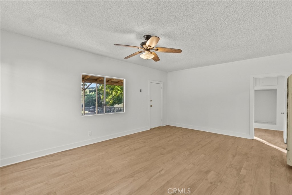 30541 Hasley Canyon Road Castaic, CA 91384 - Photo 6 of 31 a view of a big room with carpet