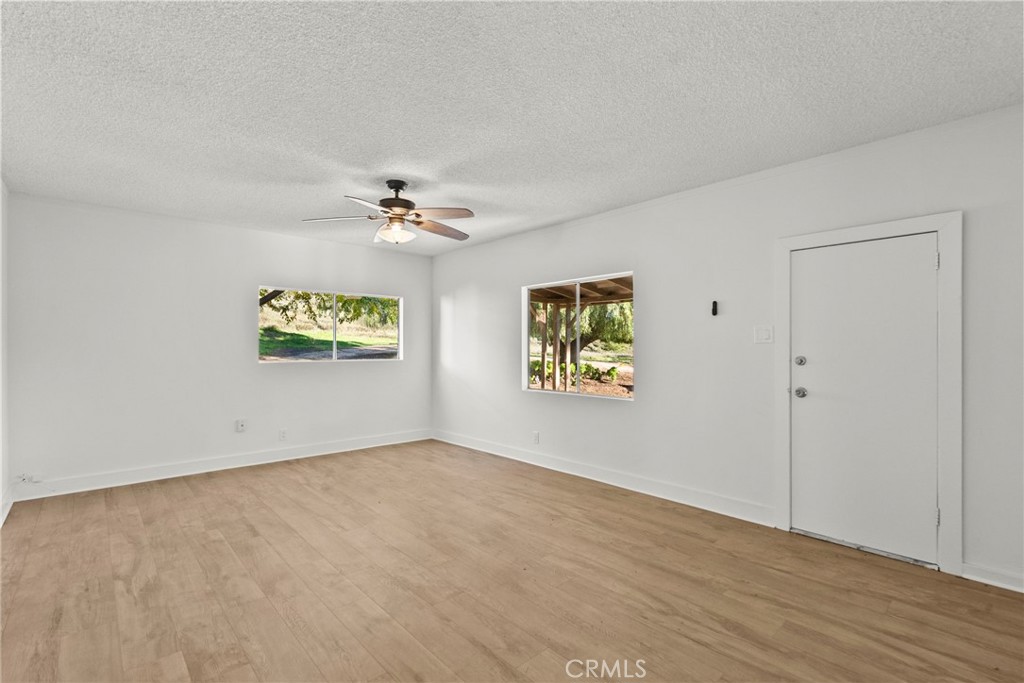 30541 Hasley Canyon Road Castaic, CA 91384 - Photo 7 of 31 an empty room with a window