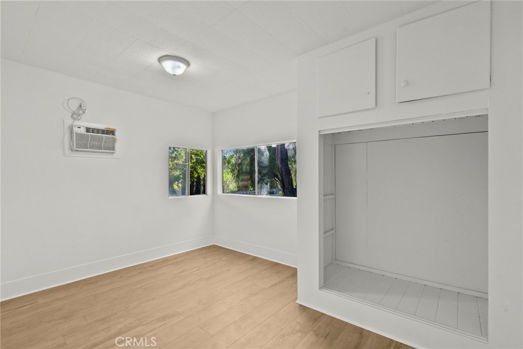 30541 Hasley Canyon Road Castaic, CA 91384 - Photo 8 of 31 a view of an empty room with a window