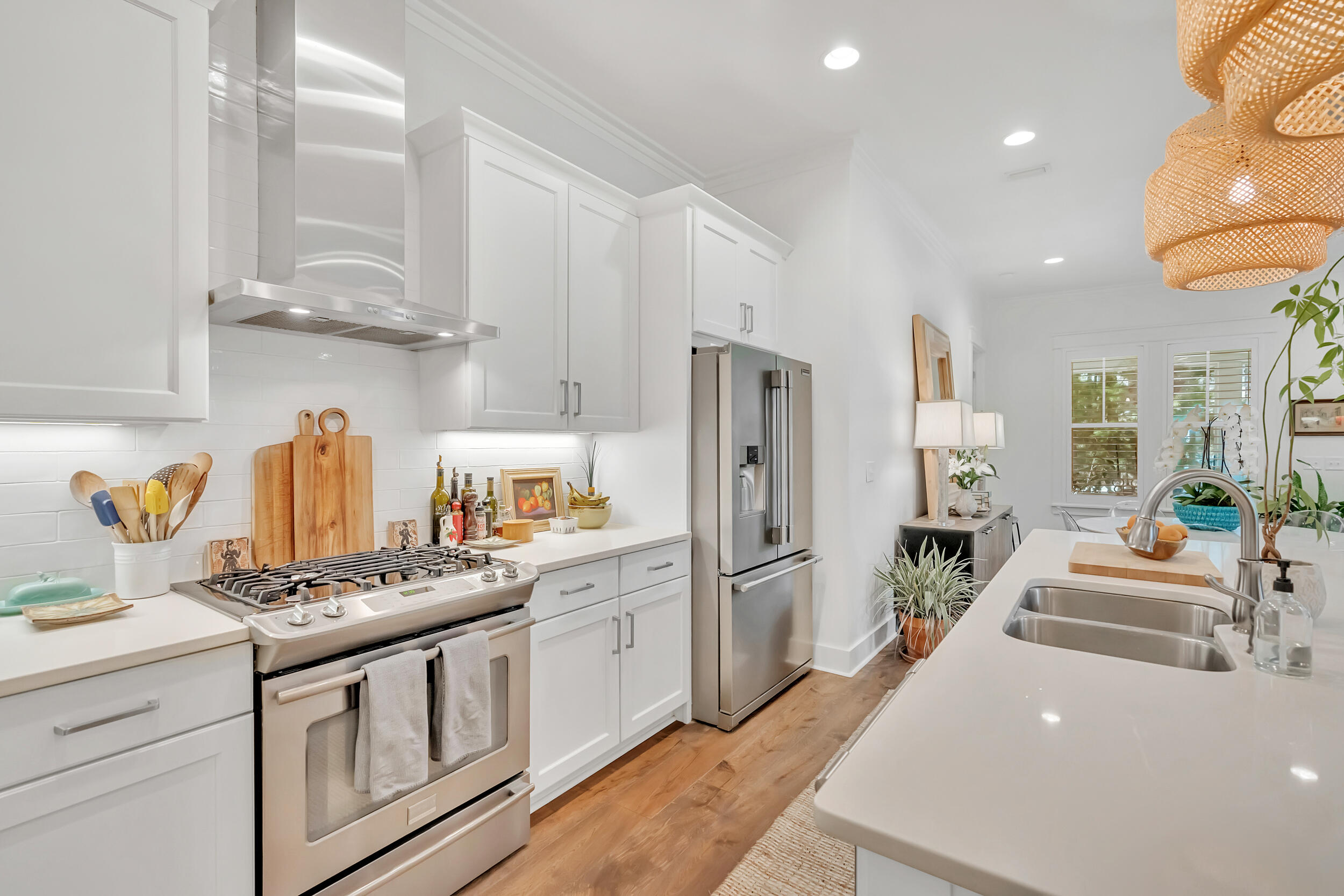 76 Jack Knife Drive Inlet Beach, FL 32461 - Photo 13 of 43 a kitchen with stainless steel appliances a stove a refrigerator and cabinets
