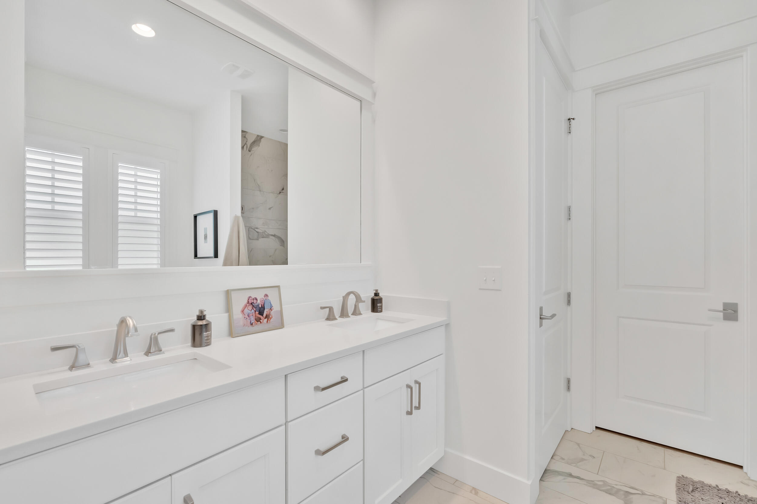 76 Jack Knife Drive Inlet Beach, FL 32461 - Photo 28 of 43 a bathroom with double vanity sink a mirror and a shower