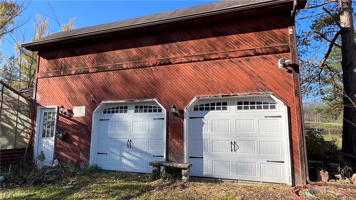 1148 Ridge Road Hinckley, OH 44233 - Photo 21 of 33 2 car garage with loft area for additional storage and separate electrical panel