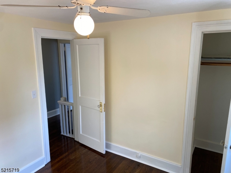 36 Elm Road Caldwell, NJ 07006 - Photo 18 of 28 a view of a room with wooden floor