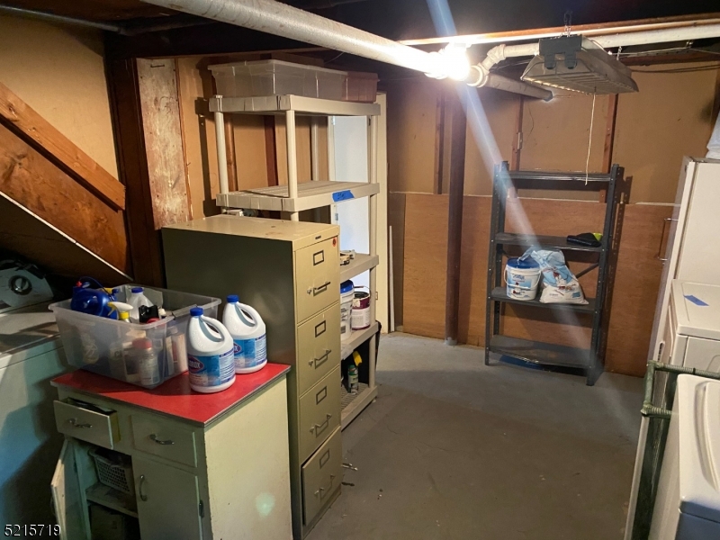 36 Elm Road Caldwell, NJ 07006 - Photo 27 of 28 a utility room with dryer and washer