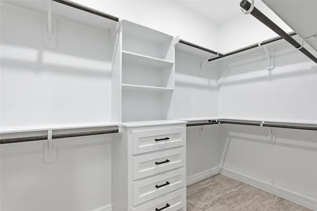 a view of an empty walk in closet