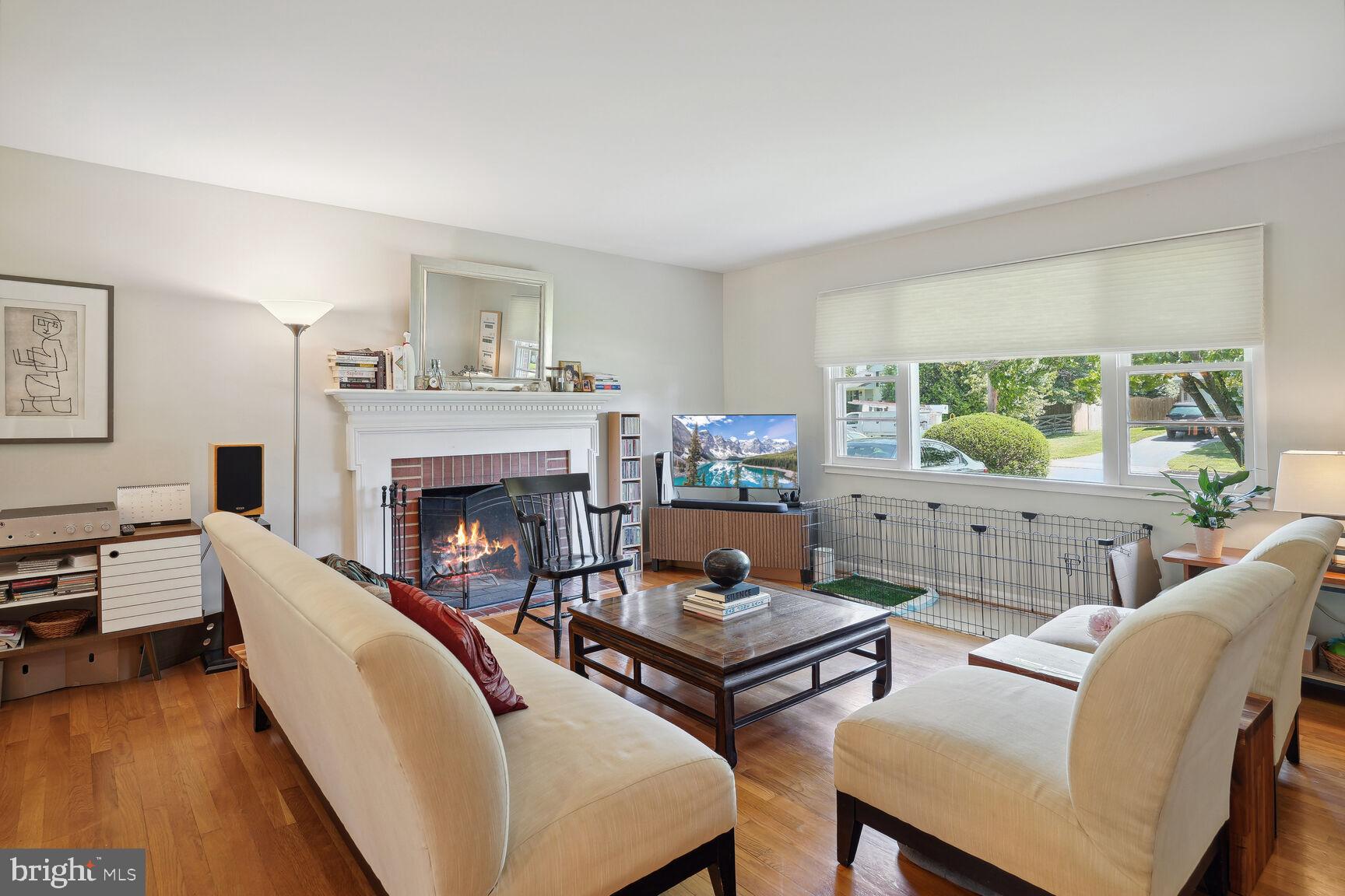 7011 Hector Road McLean, VA 22101 - Photo 5 of 20 a living room with furniture and a fireplace