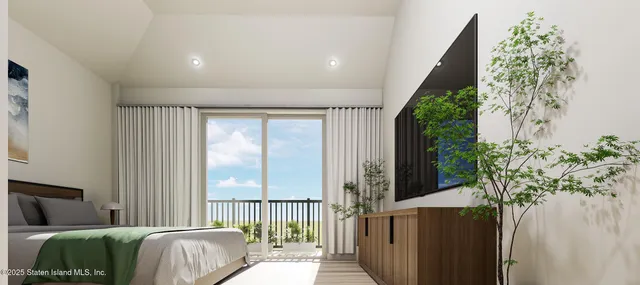 a bedroom with a bed and a view of balcony