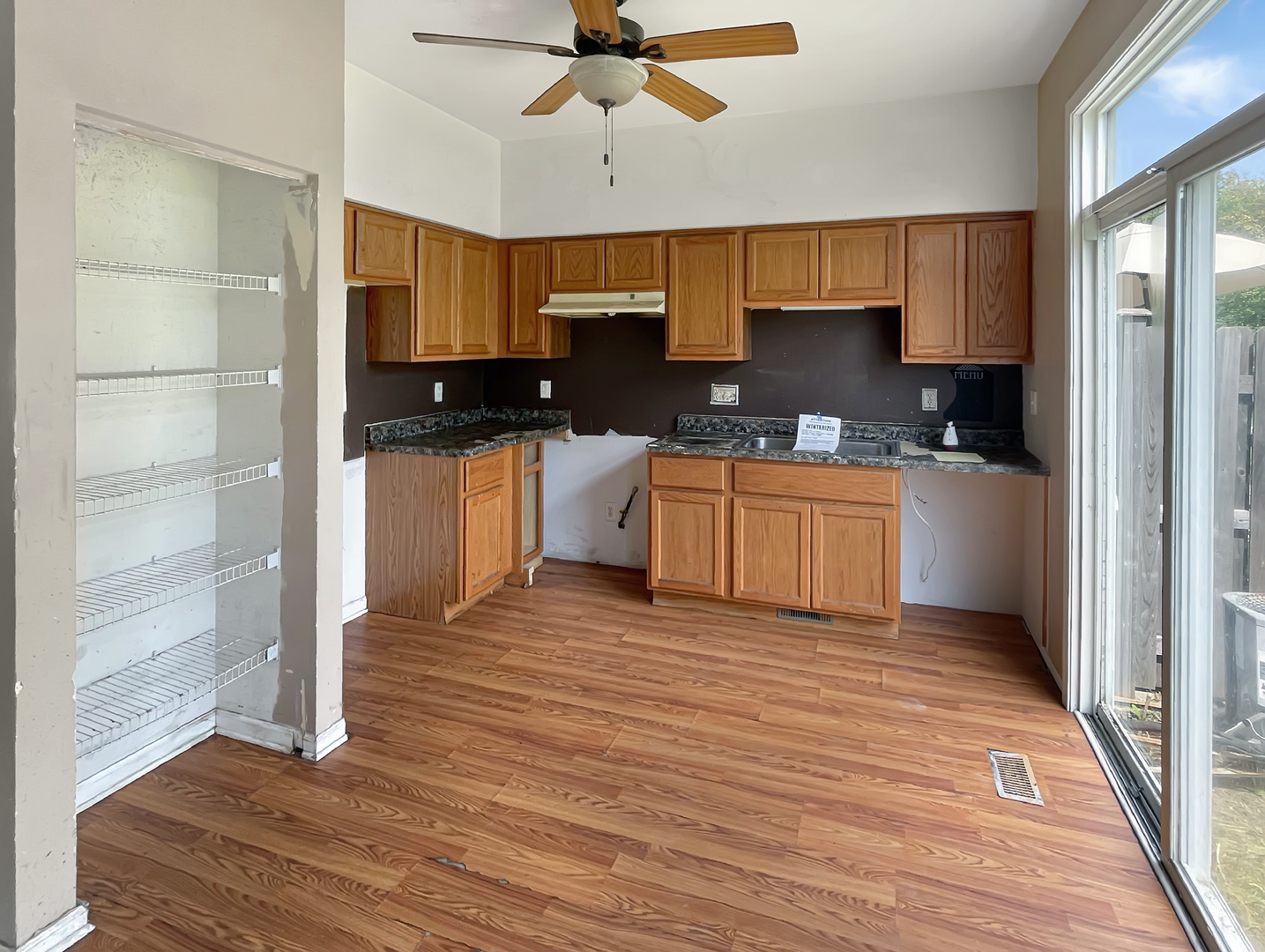 625 Edward Drive Romeoville, IL 60446 - Photo 4 of 15 a kitchen with stainless steel appliances granite countertop a sink and a stove