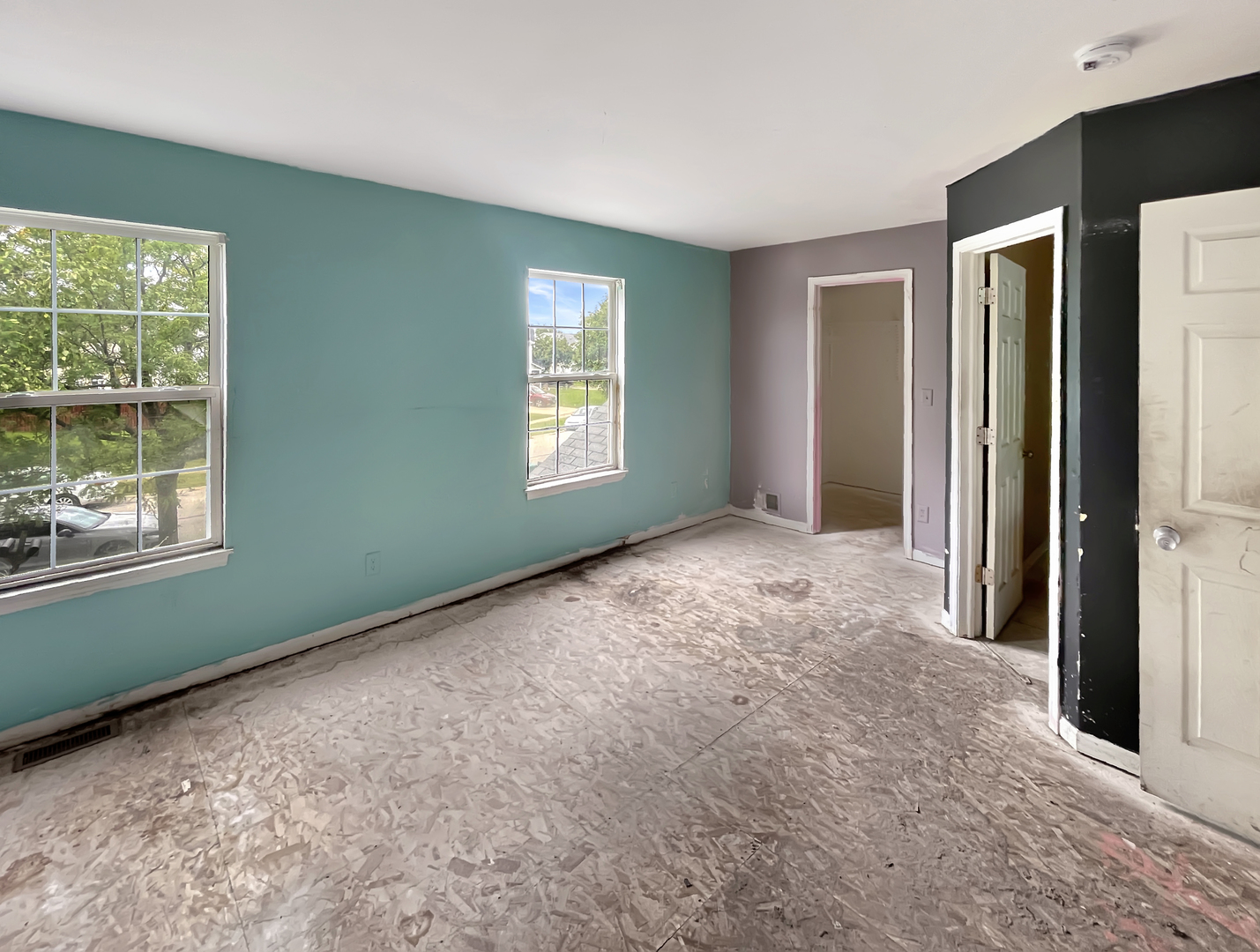 625 Edward Drive Romeoville, IL 60446 - Photo 6 of 15 a view of an empty room with windows and closet