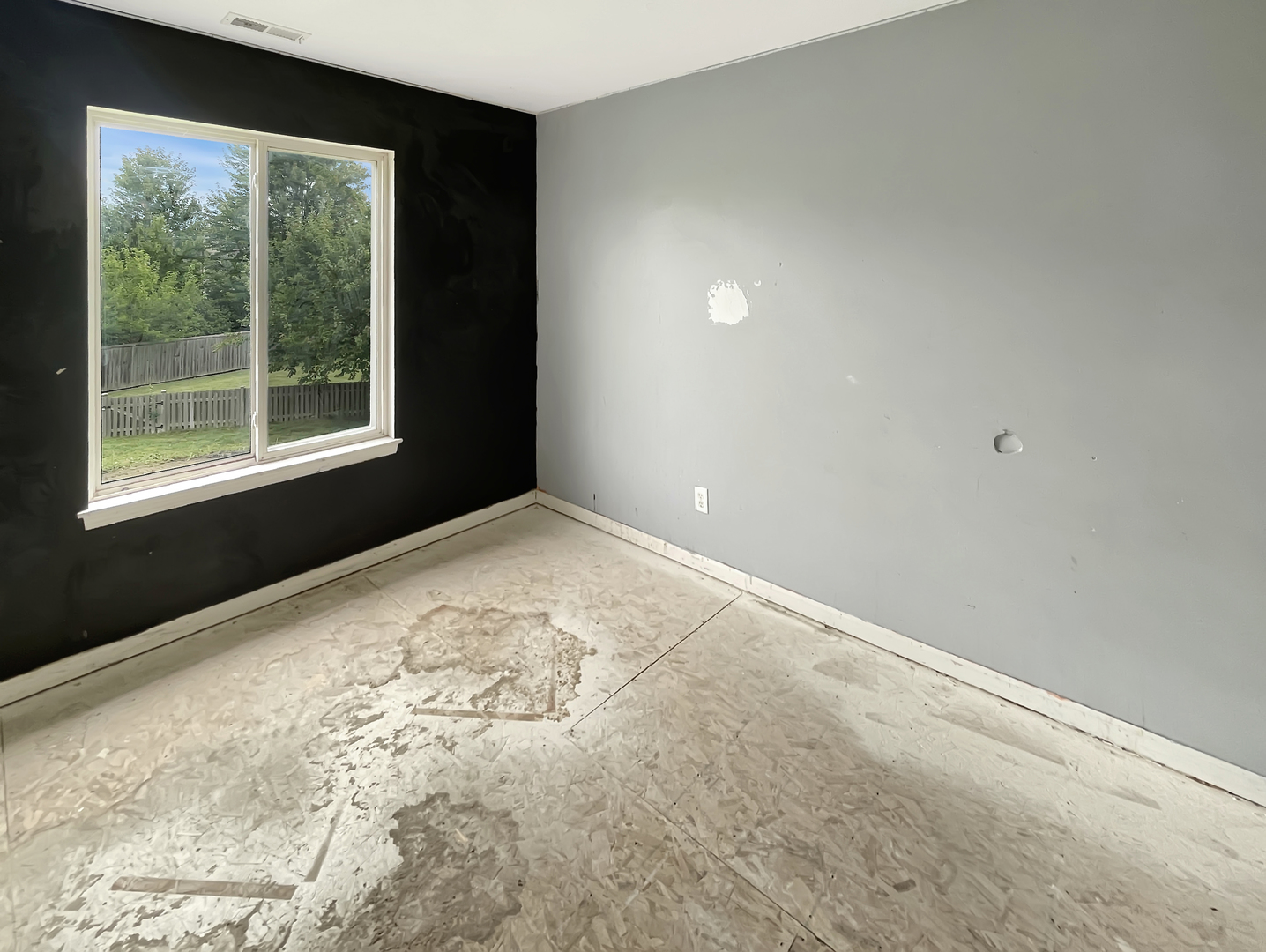 625 Edward Drive Romeoville, IL 60446 - Photo 8 of 15 a view of an empty room with a window