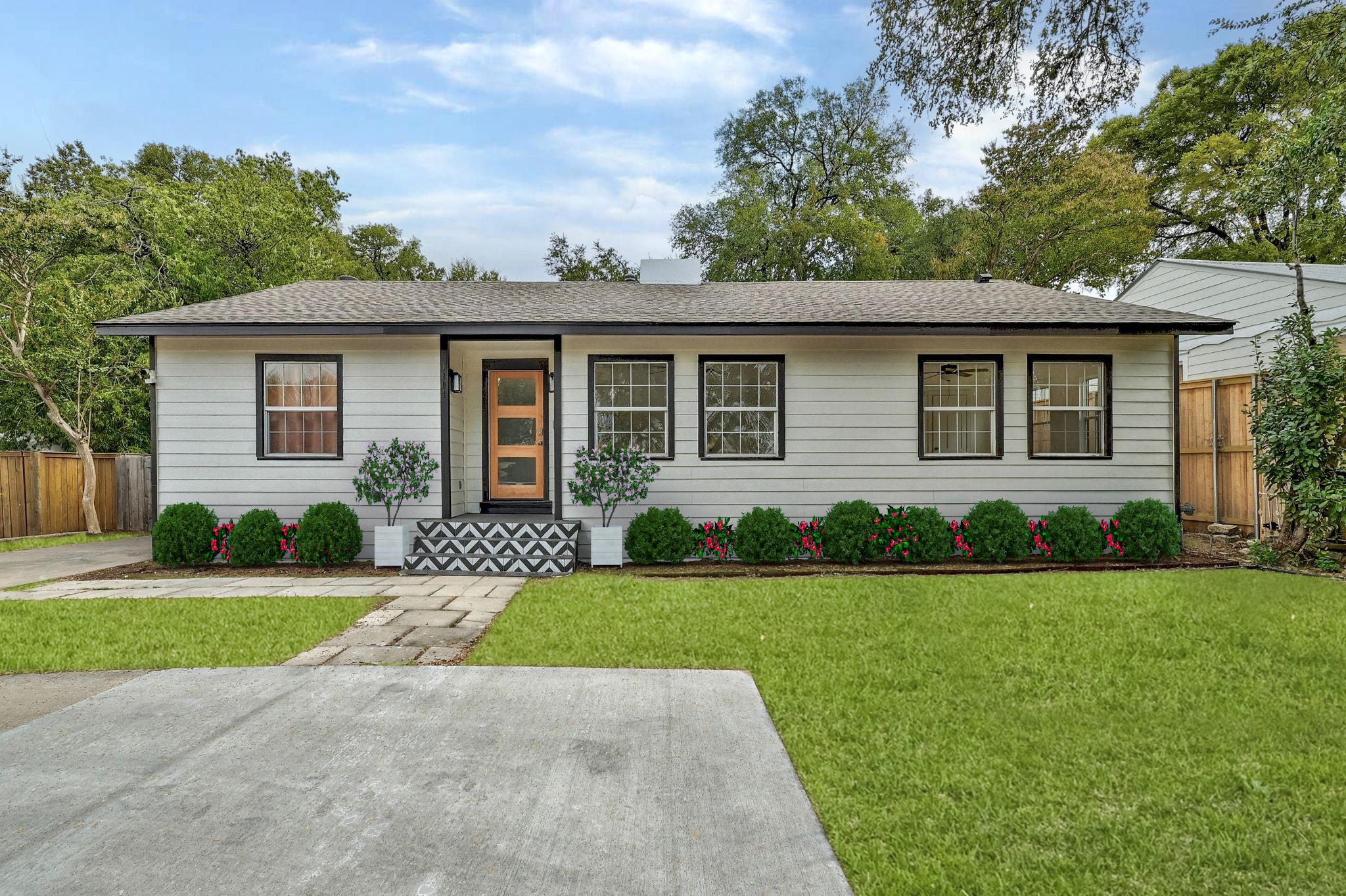 front view of a house with a yard