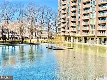 a view of swimming pool from a balcony