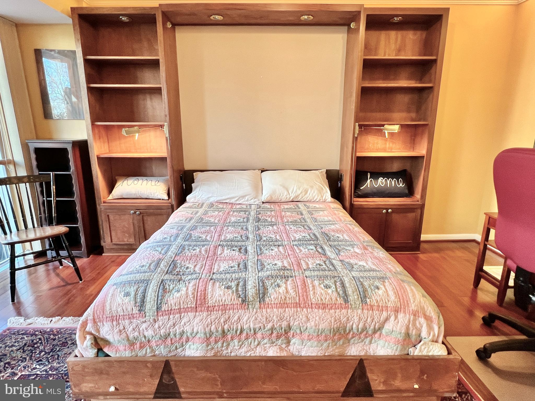 520 N Street Southwest, Unit S112 Washington, DC 20024 - Photo 9 of 46 a large bed sitting in a bedroom next to a window