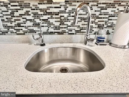 a bathroom with a sink a toilet and vanity