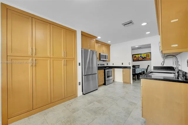 a bedroom with a bed and a walk in closet