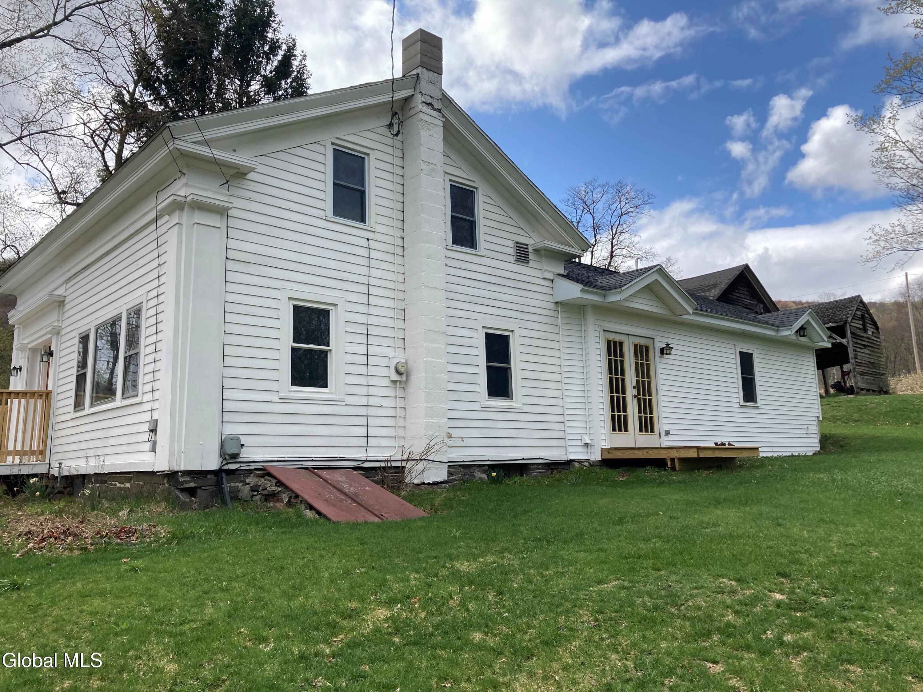 215 Tuscan Road Worcester, NY 12197 - Photo 1 of 21 Side of house