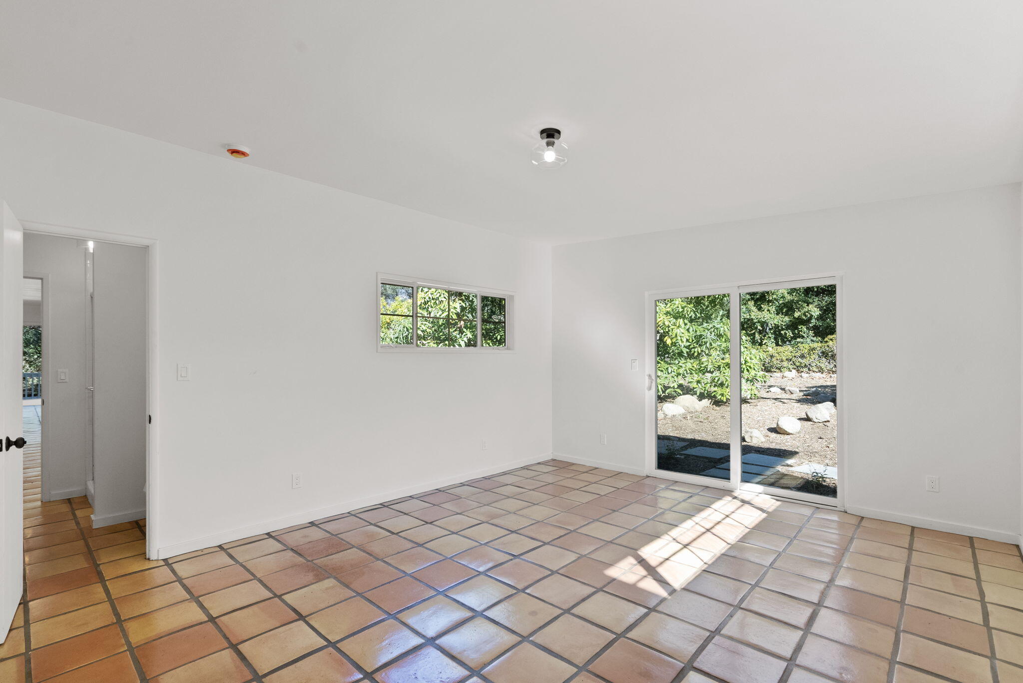 633 Tabor Lane Montecito, CA 93108 - Photo 20 of 30 a bedroom with a bed and a window