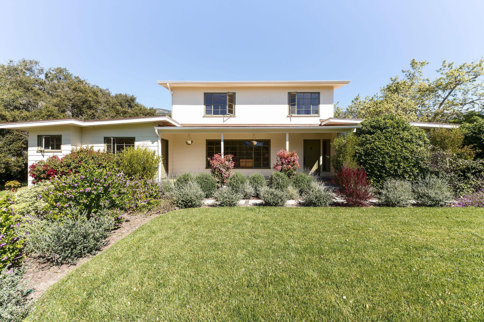 633 Tabor Lane Montecito, CA 93108 - Photo 28 of 30 a front view of house with a garden