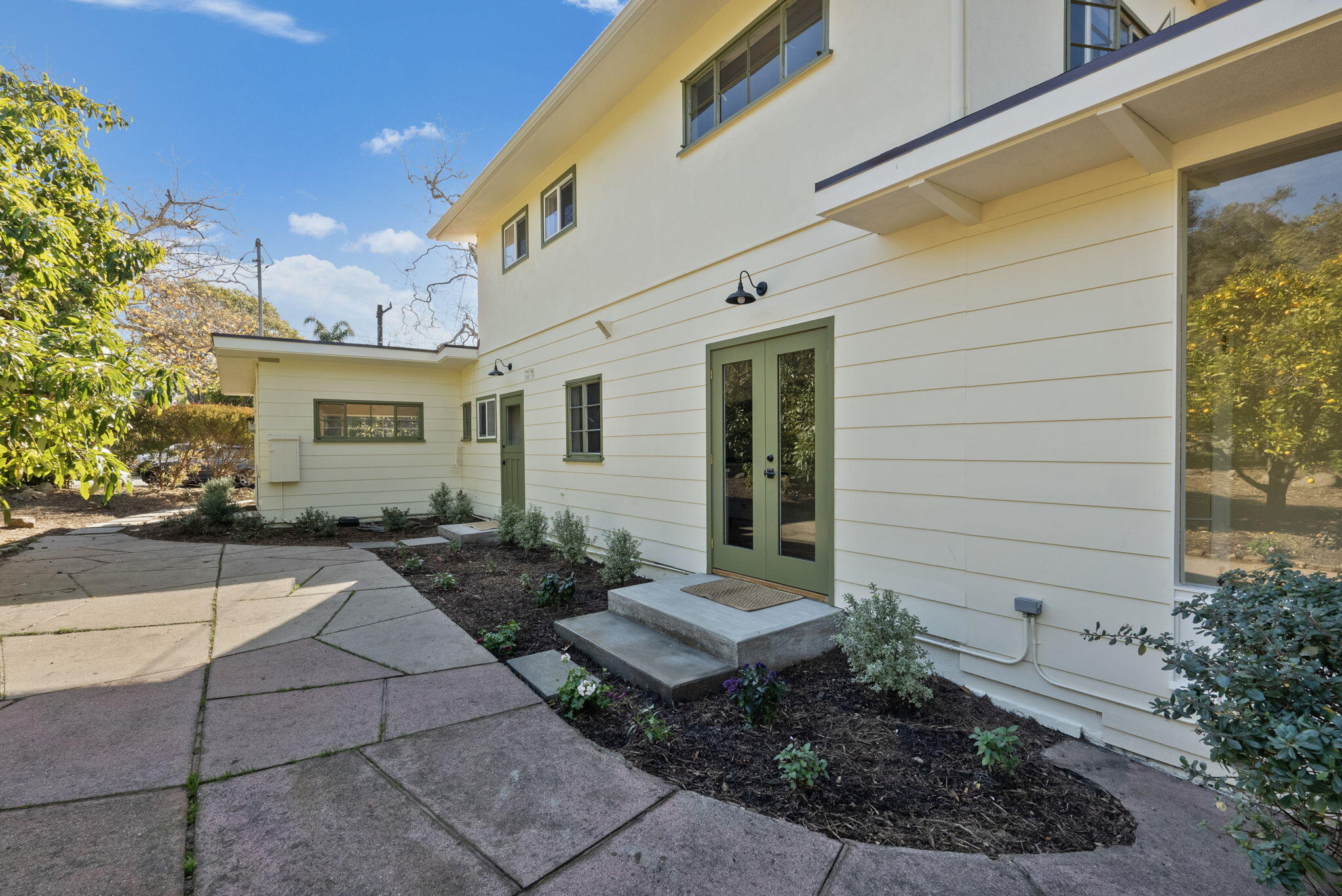 633 Tabor Lane Montecito, CA 93108 - Photo 7 of 30 a front view of a house with garden