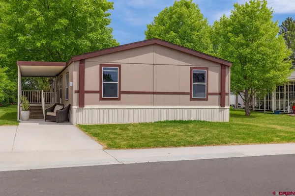 a view of a back yard of the house