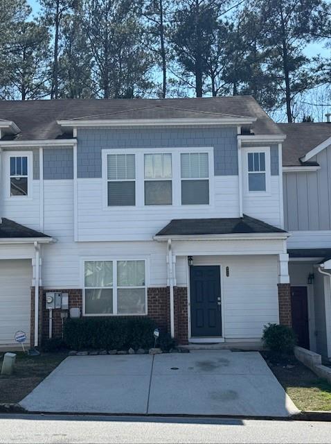 4433 Watson Ridge Drive Stone Mountain, GA 30083 - Photo 2 of 48 a front view of a house with yard