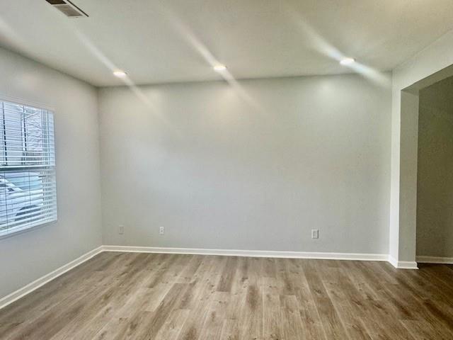 4433 Watson Ridge Drive Stone Mountain, GA 30083 - Photo 26 of 48 a view of an empty room with wooden floor and a window