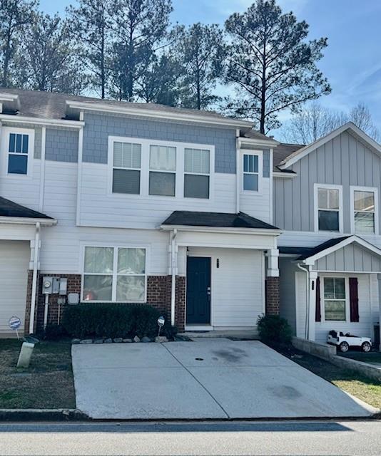 4433 Watson Ridge Drive Stone Mountain, GA 30083 - Photo 3 of 48 front view of a house with a yard