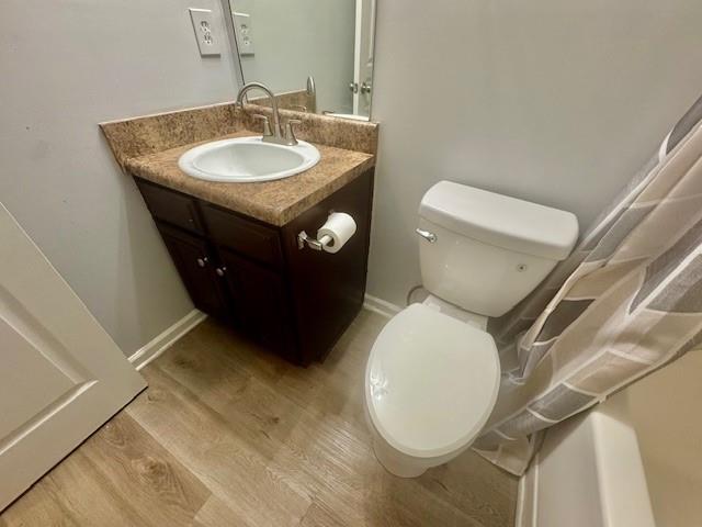 4433 Watson Ridge Drive Stone Mountain, GA 30083 - Photo 32 of 48 a bathroom with a toilet sink and mirror