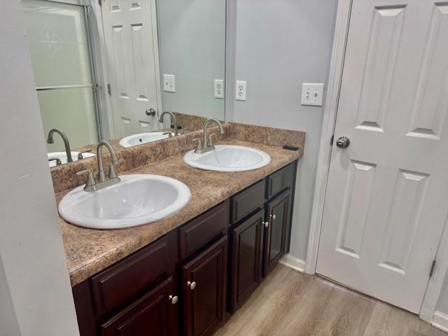 4433 Watson Ridge Drive Stone Mountain, GA 30083 - Photo 42 of 48 a bathroom with a sink and a mirror