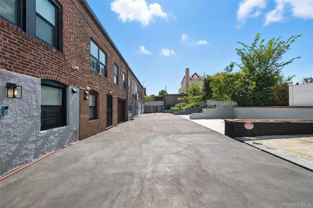 a front view of building with street