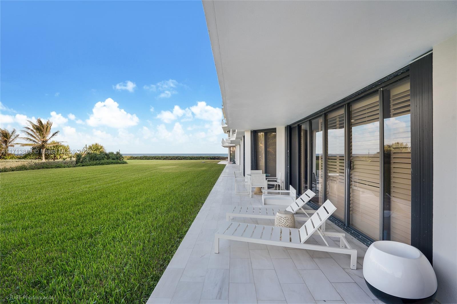 2100 South Ocean Boulevard, Unit 103N Palm Beach, FL 33480 - Photo 2 of 14 a view of outdoor space with garden and patio