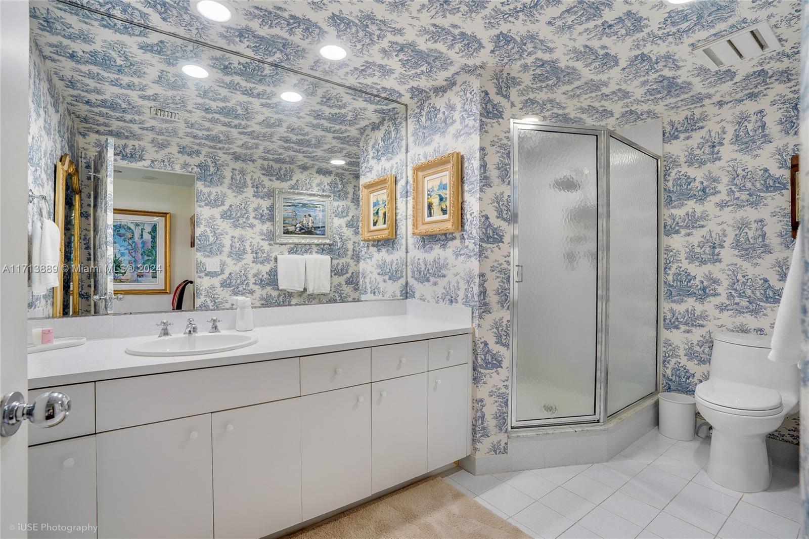 2100 South Ocean Boulevard, Unit 103N Palm Beach, FL 33480 - Photo 7 of 14 a bathroom with a sink toilet and shower